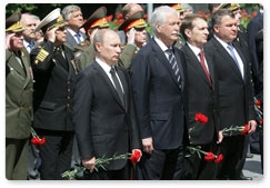 Prime Minister Vladimir Putin participates in a wreath-laying ceremony at the Tomb of the Unknown Soldier dedicated to the 70th anniversary of the start of the Great Patriotic War