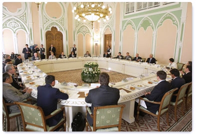 Vladimir Putin continues his meeting with the Urals Federal District regional heads who are United Russia party members at a business lunch
