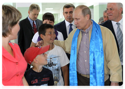 Prime Minister Vladimir Putin visiting a culture, education and sports centre in the village of Tungui in Buryatia|1 july, 2011|15:01