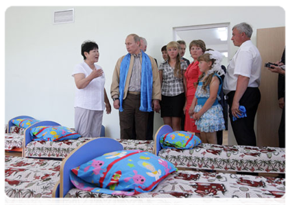 Prime Minister Vladimir Putin visiting a culture, education and sports centre in the village of Tungui in Buryatia|1 july, 2011|15:01