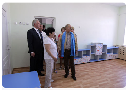 Prime Minister Vladimir Putin visiting a culture, education and sports centre in the village of Tungui in Buryatia|1 july, 2011|15:01