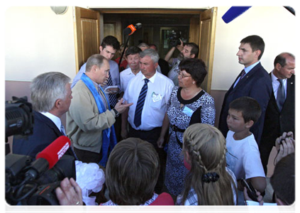 Prime Minister Vladimir Putin visiting a culture, education and sports centre in the village of Tungui in Buryatia|1 july, 2011|17:52