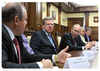 Prime Minister Vladimir Putin and Alexei Kudrin, a deputy prime minister and finance minister, meeting with top executives of Buryatia’s industrial enterprises in the region’s capital, Ulan Ude|1 july, 2011|17:58