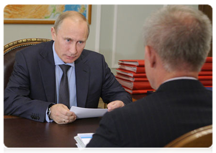 Prime Minister Vladimir Putin talking with Ulyanovsk Region Governor Sergei Morozov|18 july, 2011|11:11