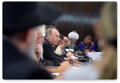 Prime Minister Vladimir Putin meets with representatives of different faiths, ethnic and public organisations
