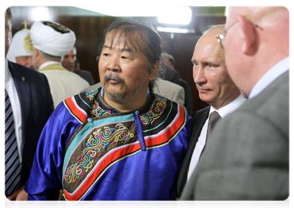 Prime Minister Vladimir Putin with Pavel Sulyandziga, first vice president of the Association of Indigenous Ethnic Minorities of the Russian North, Siberia and Far East|19 july, 2011|19:53