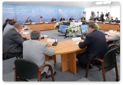 Prime Minister Vladimir Putin chairs a meeting on low-rise housing construction at Stupino near Moscow