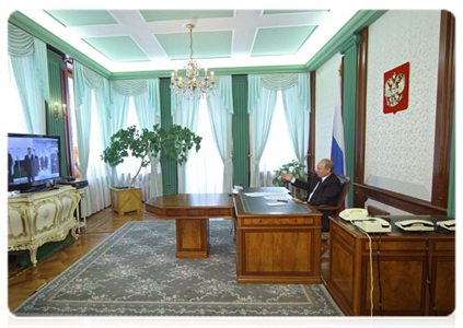 Prime Minister Vladimir Putin, in a video conference, taking part in commissioning new power units at the Surgut state district power station No. 2 and the Sredneuralsk state district power station|25 july, 2011|16:22