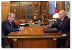 Prime Minister Vladimir Putin holds a working meeting with Irkutsk Region Governor Dmitry Mezentsev