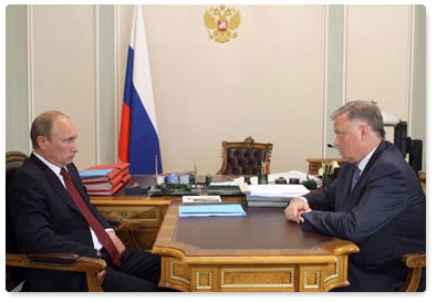 Prime Minister Vladimir Putin holds a working meeting with President of Russian Railways Vladimir Yakunin