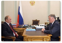 Prime Minister Vladimir Putin holds a working meeting with President of Russian Railways Vladimir Yakunin