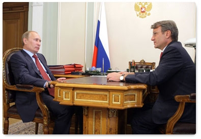 Prime Minister Vladimir Putin meets with Sberbank head German Gref