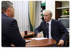 Vladimir Putin discusses social and economic development of the Leningrad Region with Governor Valery Serdyukov