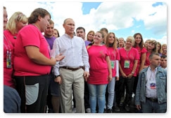 Prime Minister Vladimir Putin visits booths and speaks with participants at the Seliger-2011 International Youth Forum