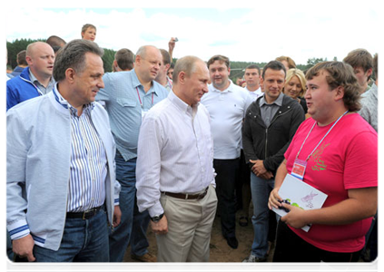 Prime Minister Vladimir Putin visits booths and speaks with participants at the Seliger-2011 International Youth Forum|1 august, 2011|18:08