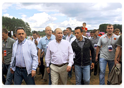 Prime Minister Vladimir Putin visits booths and speaks with participants at the Seliger-2011 International Youth Forum|1 august, 2011|18:33