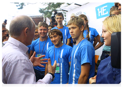 Prime Minister Vladimir Putin visits booths and speaks with participants at the Seliger-2011 International Youth Forum|1 august, 2011|18:34