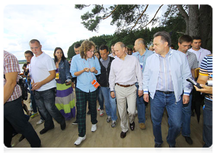 Prime Minister Vladimir Putin visits booths and speaks with participants at the Seliger-2011 International Youth Forum|1 august, 2011|18:34