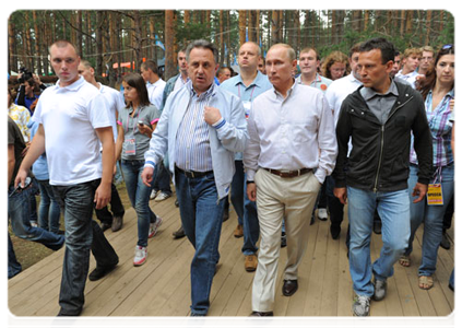 Prime Minister Vladimir Putin visits booths and speaks with participants at the Seliger-2011 International Youth Forum|1 august, 2011|18:35