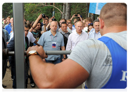 Prime Minister Vladimir Putin visits booths and speaks with participants at the Seliger-2011 International Youth Forum|1 august, 2011|19:10