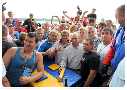 Prime Minister Vladimir Putin visits booths and speaks with participants at the Seliger-2011 International Youth Forum|1 august, 2011|19:11