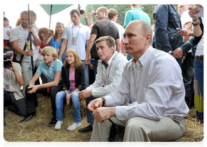 Prime Minister Vladimir Putin visits booths and speaks with participants at the Seliger-2011 International Youth Forum|1 august, 2011|19:40