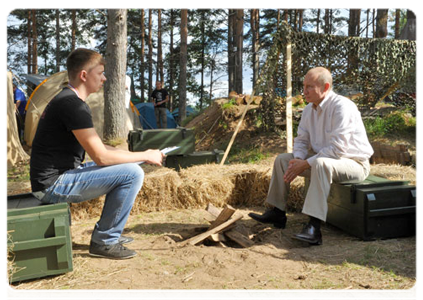 Prime Minister Vladimir Putin talks about his father, a WWII veteran, during an interview with the creators of the “Your War Movie” project at the Seliger youth camp|1 august, 2011|20:03