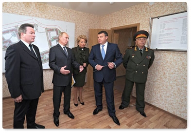 Prime Minister Vladimir Putin visits the Osinovaya Roshcha residential area, built for retired military officers