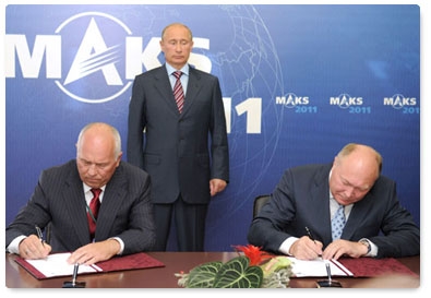 Prime Minister Vladimir Putin attends a contract-signing ceremony at the MAKS international air show