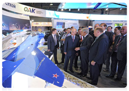 Prime Minister Vladimir Putin at the Unified Aircraft Corporation pavilion|17 august, 2011|20:54