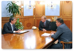 Prime Minister Vladimir Putin meets with Deputy Prime Minister Igor Sechin and Minister of Defence Anatoly Serdyukov to discuss the placement of state defence contracts at a number of United Shipbuilding Corporation enterprises