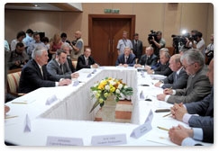 Prime Minister Vladimir Putin meets with chief executives of ExxonMobil in Sochi