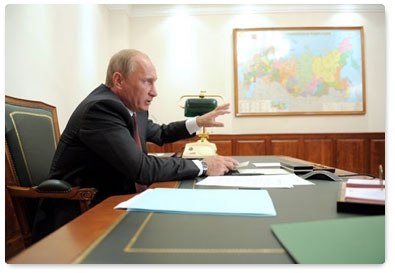 Prime Minister Vladimir Putin holds a videoconference on road building