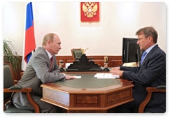 Prime Minister Vladimir Putin  meets with Sberbank Chairman and CEO German Gref