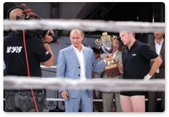 Prime Minister Vladimir Putin visits the Plotform S-70 Mixed Martial Arts International Tournament in Sochi and attends the awards ceremony