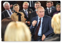 Prime Minister Vladimir Putin meets with parliamentary candidates after primary voting