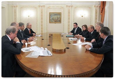 Prime Minister Vladimir Putin meets with Deutsche Bank CEO Josef Ackermann