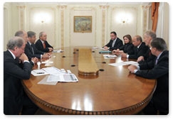 Prime Minister Vladimir Putin meets with Deutsche Bank CEO Josef Ackermann