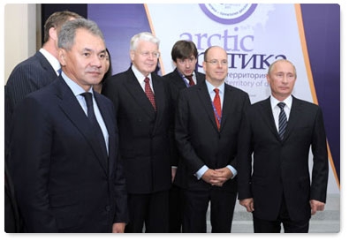 Prime Minister Vladimir Putin takes part in a video conference with the Prirazlomnaya ice-resistant oil platform