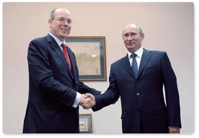 Vladimir Putin meets with ruling Prince Albert II of Monaco at the International Arctic Forum in Archangelsk