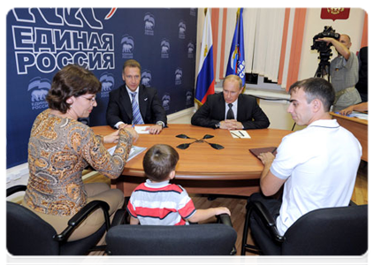 Prime Minister Vladimir Putin receiving people at the public reception room of the United Russia chairman in Vladivostok. The reception was attended by First Deputy Prime Minister Igor Shuvalov|8 september, 2011|17:35