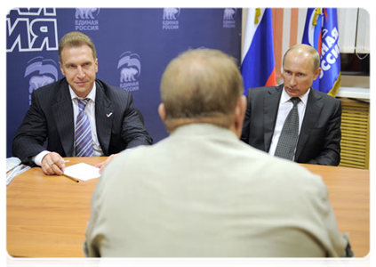 Prime Minister Vladimir Putin receiving people at the public reception room of the United Russia chairman in Vladivostok. The reception was attended by First Deputy Prime Minister Igor Shuvalov|8 september, 2011|17:35