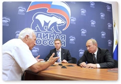 Prime Minister Vladimir Putin receives people at the public reception room of the United Russia chairman in Vladivostok. The reception was attended by First Deputy Prime Minister Igor Shuvalov