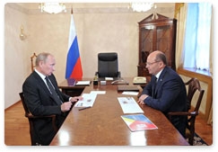 Prime Minister Vladimir Putin holds a working meeting with Sverdlovsk Region Governor Alexander Misharin
