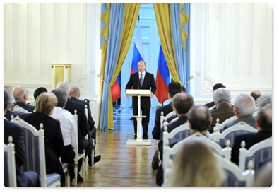 Vladimir Putin takes part in the presentation ceremony for the 2011 government print media awards