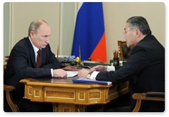 Prime Minister Vladimir Putin meets with the Head of the Republic of Kalmykia, Alexei Orlov