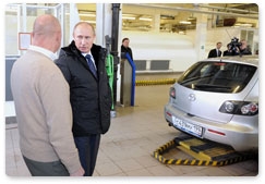 Prime Minister Vladimir Putin visits a technical inspection centre for motor vehicles in Moscow’s Strogino district