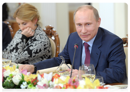 Prime Minister Vladimir Putin and RIA Novosti editor-in-chief Svetlana Mironyuk|18 january, 2012|20:16