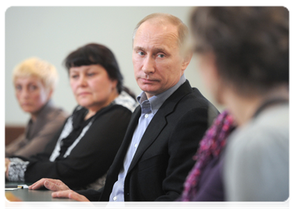 Prime Minister Vladimir Putin meets with the widows of the miners killed in the Raspadskaya mine explosions|24 january, 2012|12:19