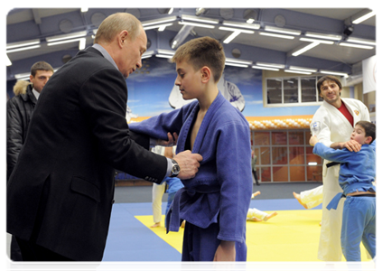 Prime Minister Vladimir Putin attends a class of young judo students during a visit to the Regional Judo Centre in Kemerovo|24 january, 2012|17:09